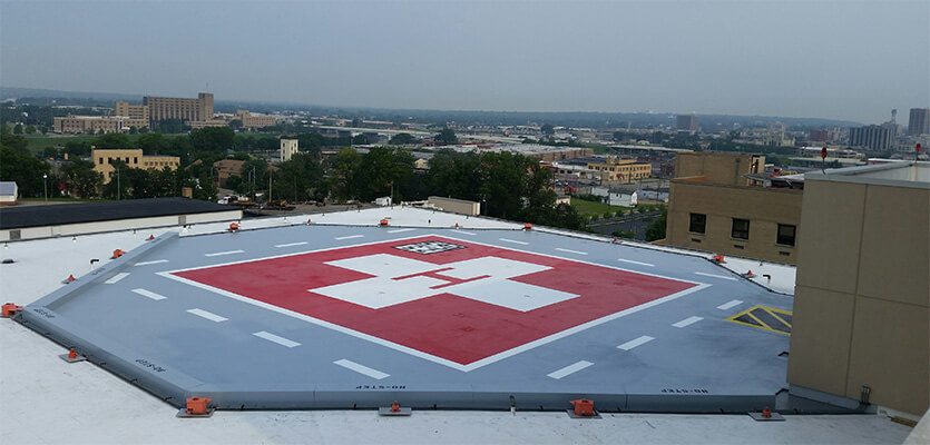 Aluminum rooftop helipad system installed on a healthcare facility for safe and efficient helicopter landings